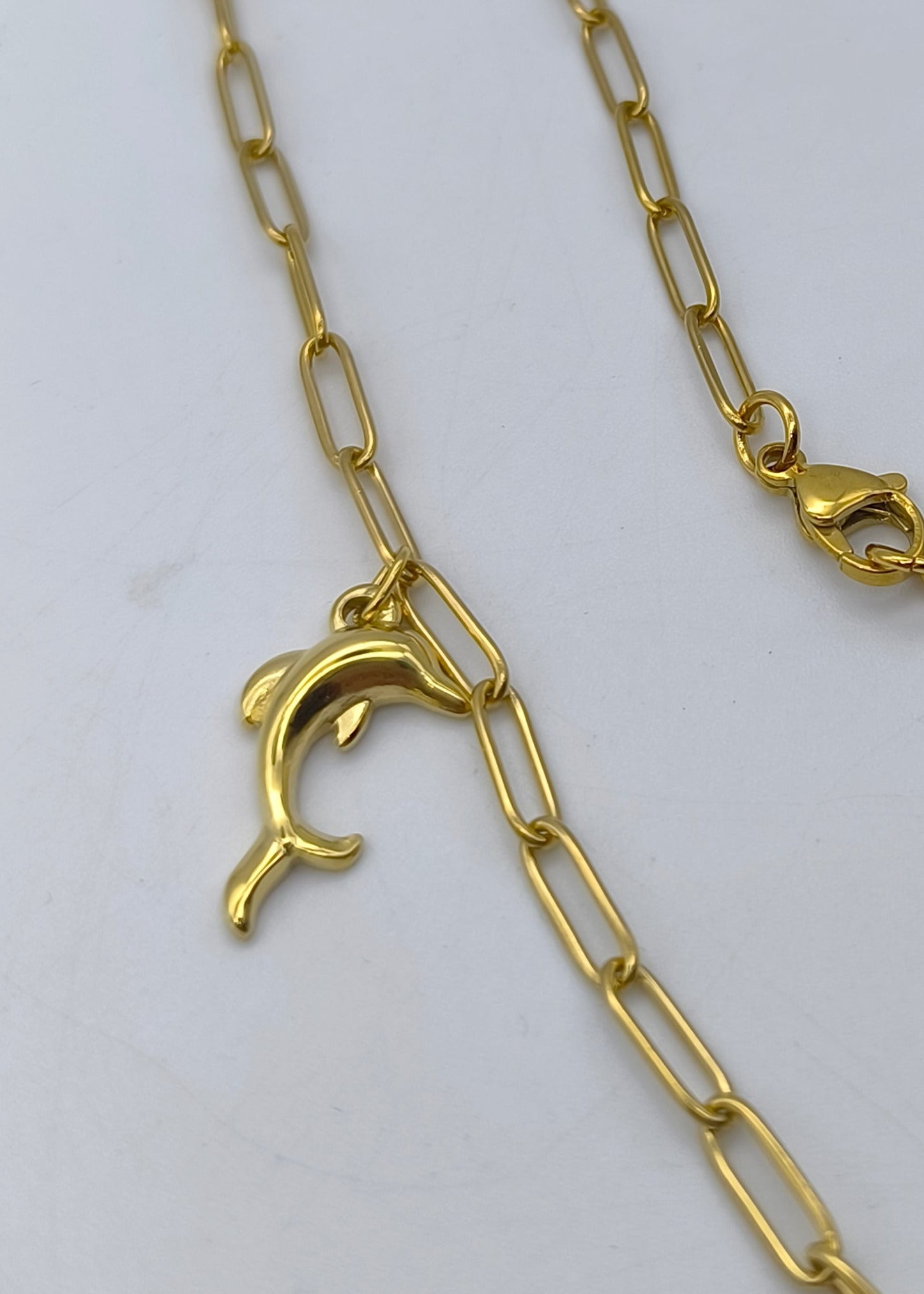 Halskette lang mit verschiedenen Charms goldfarben/hellblau