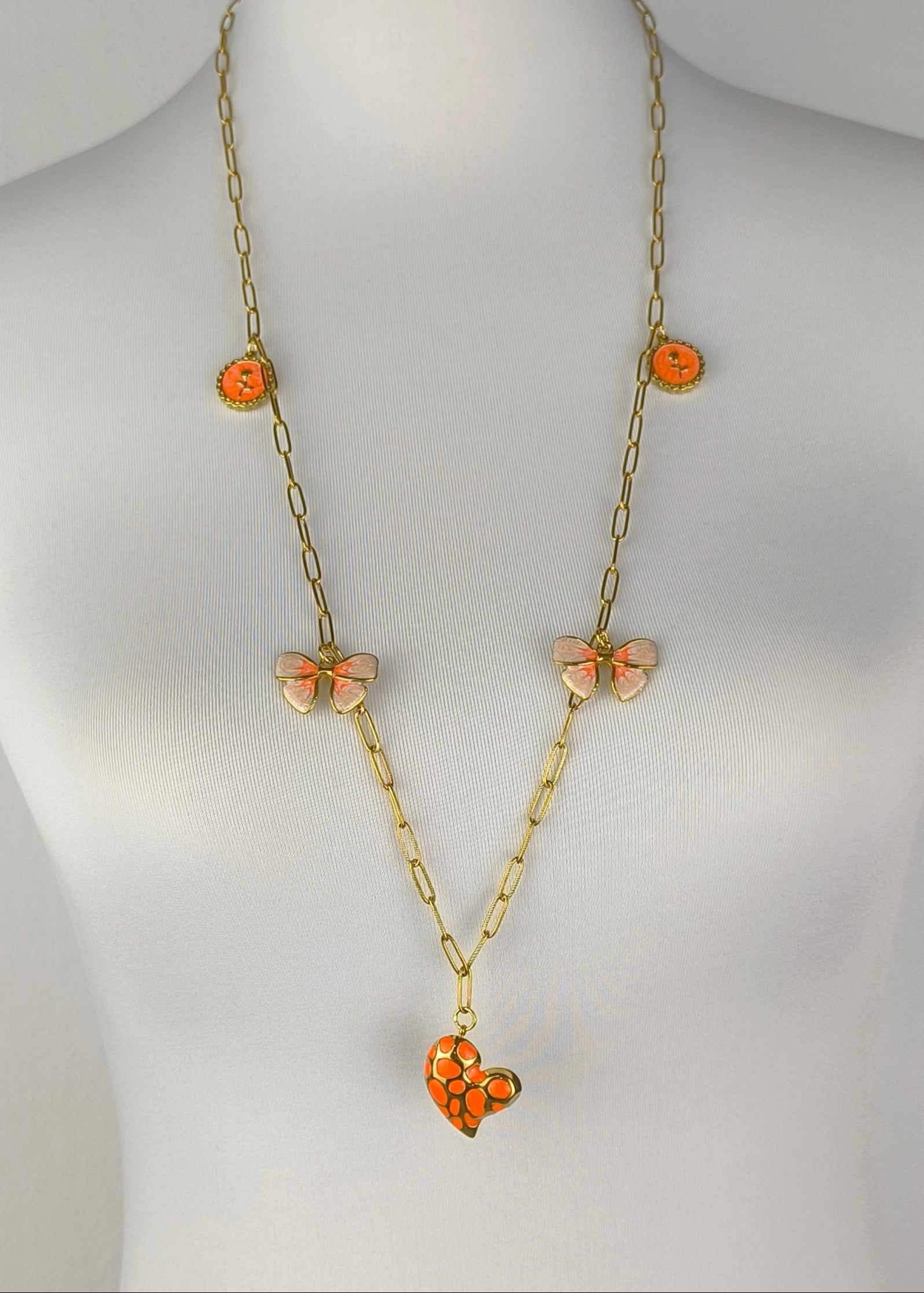 Halskette lang mit verschiedenen Charms goldfarben/orange