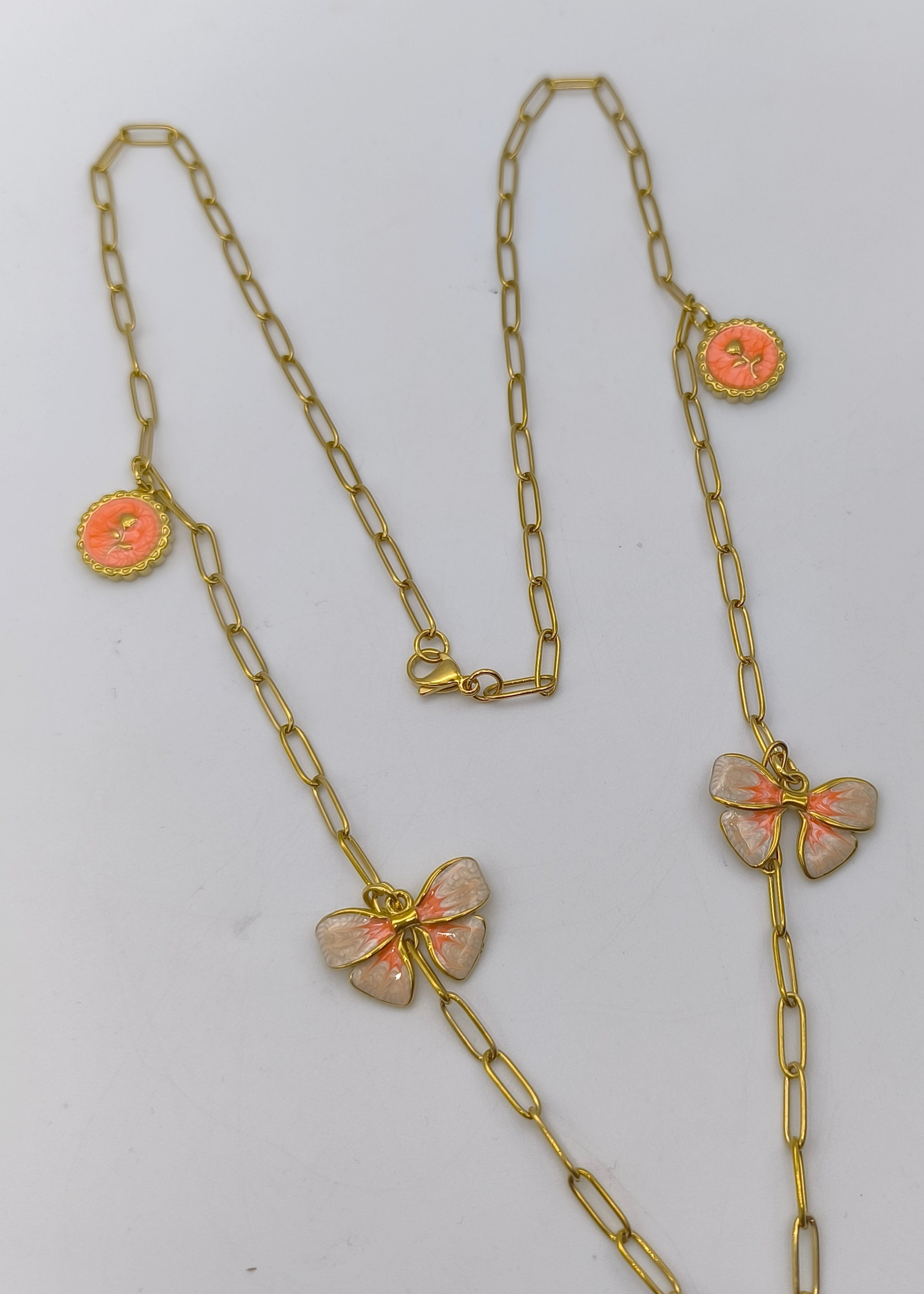 Halskette lang mit verschiedenen Charms goldfarben/orange