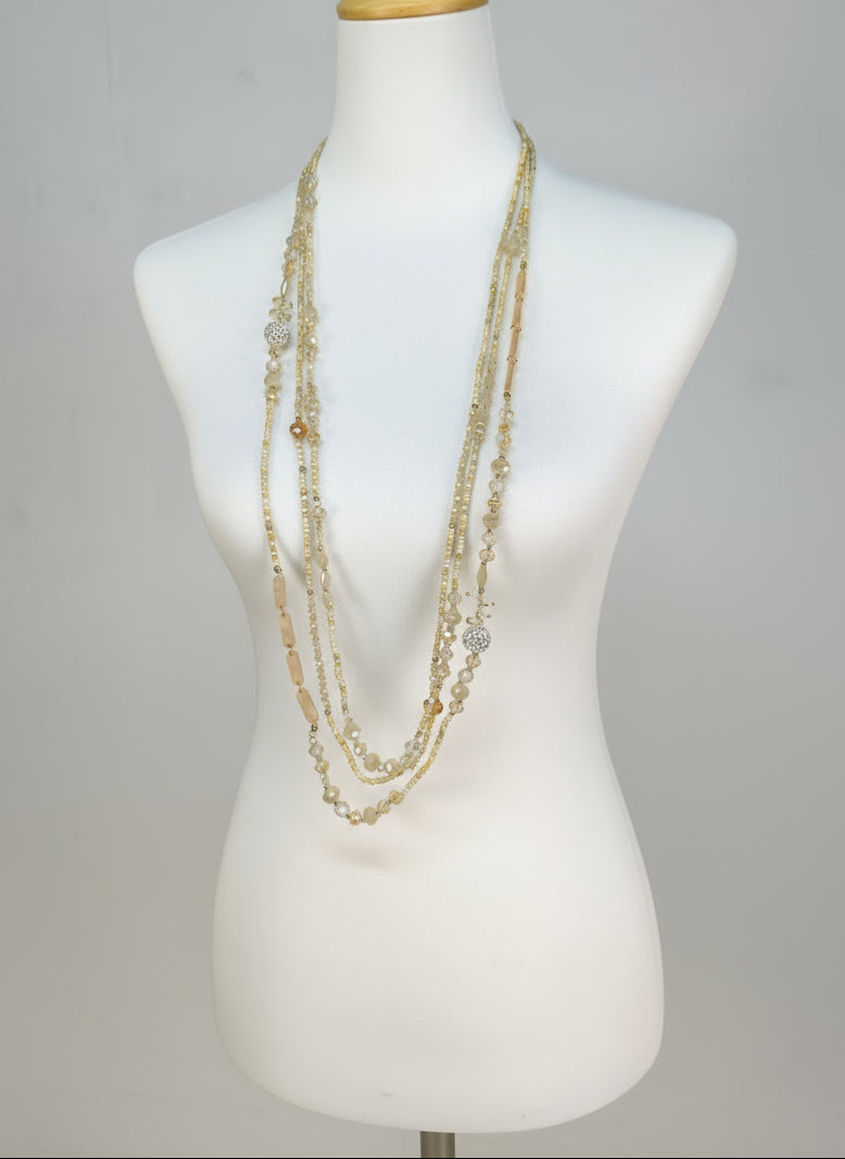 Lange Perlenkette 3 reihig creme/beige