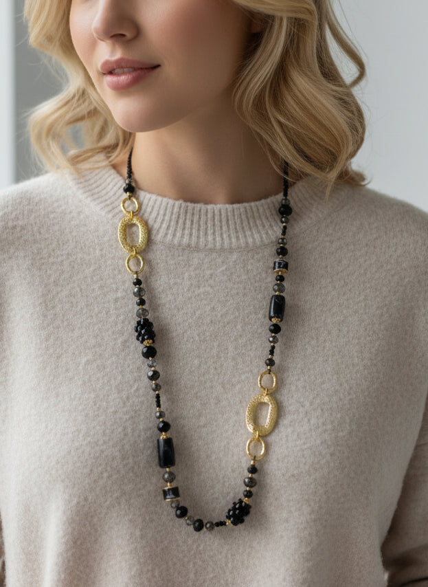 Lange Perlenkette schwarz/gold