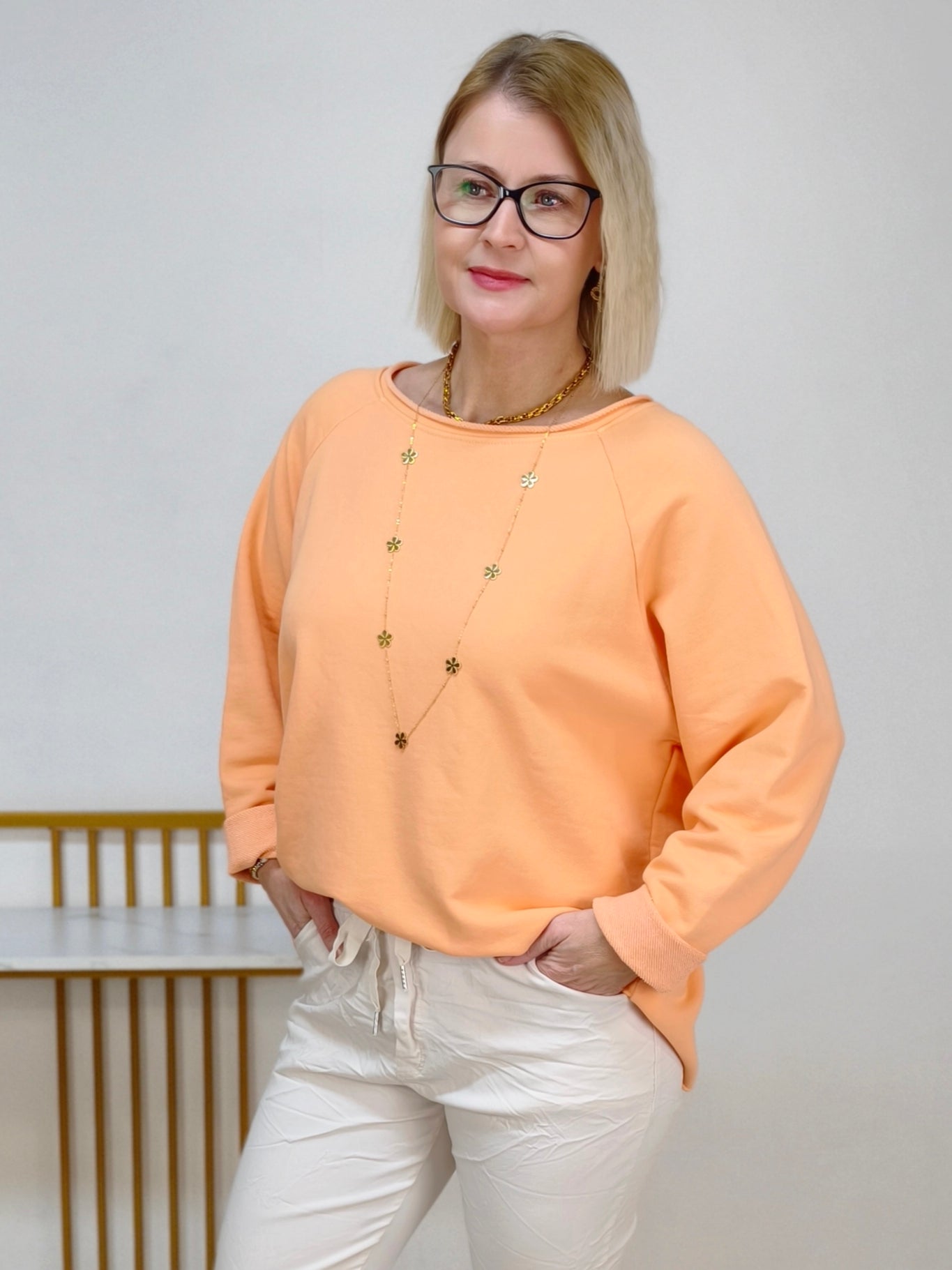 Einfarbiges Sweatshirt aus Baumwolle lachs (40-44)