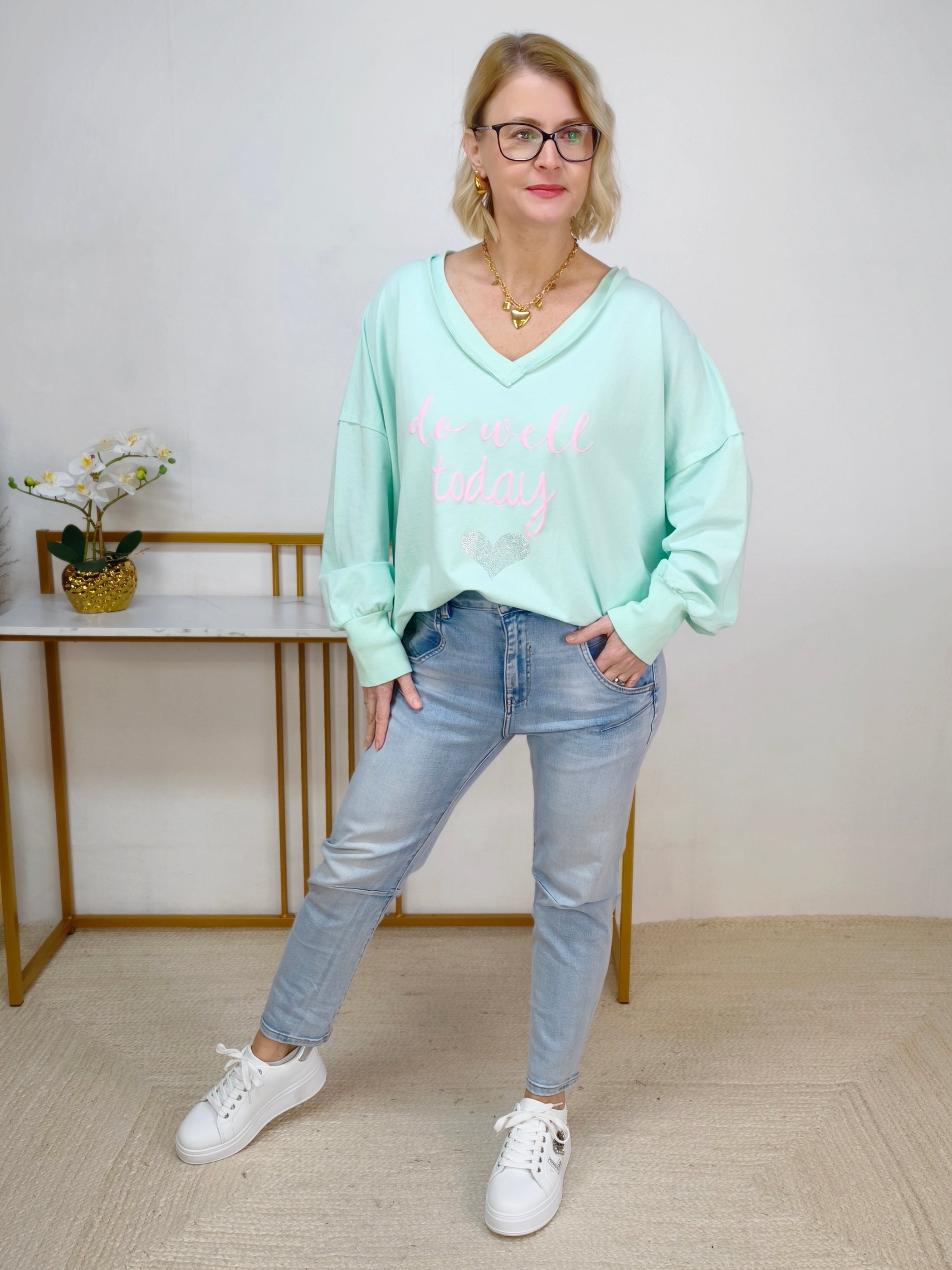 Leichtes Sweatshirt "Do well..." pastell grün (42-46/48)