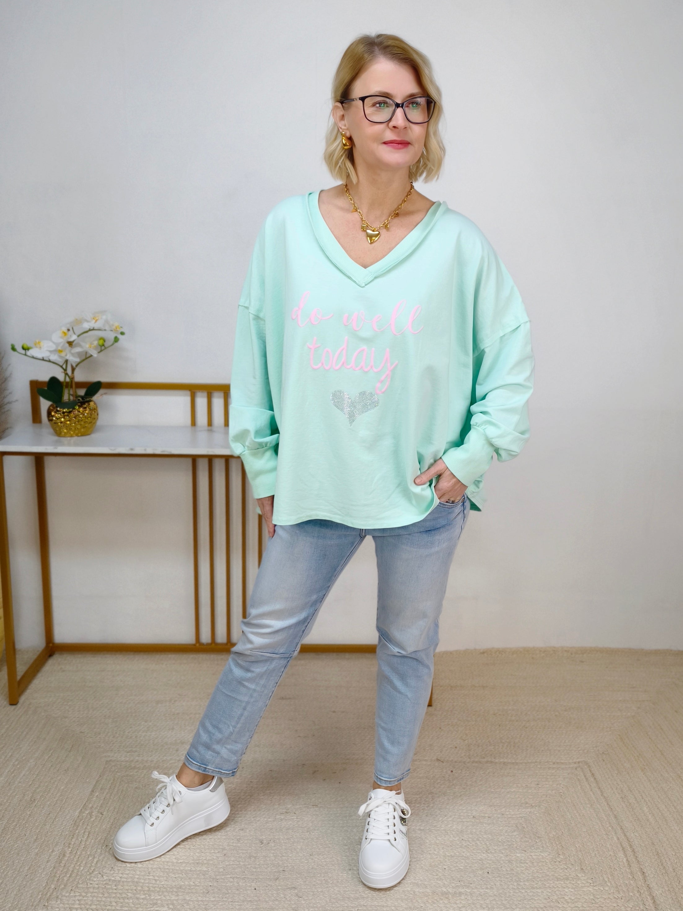 Leichtes Sweatshirt "Do well..." pastell grün (42-46/48)