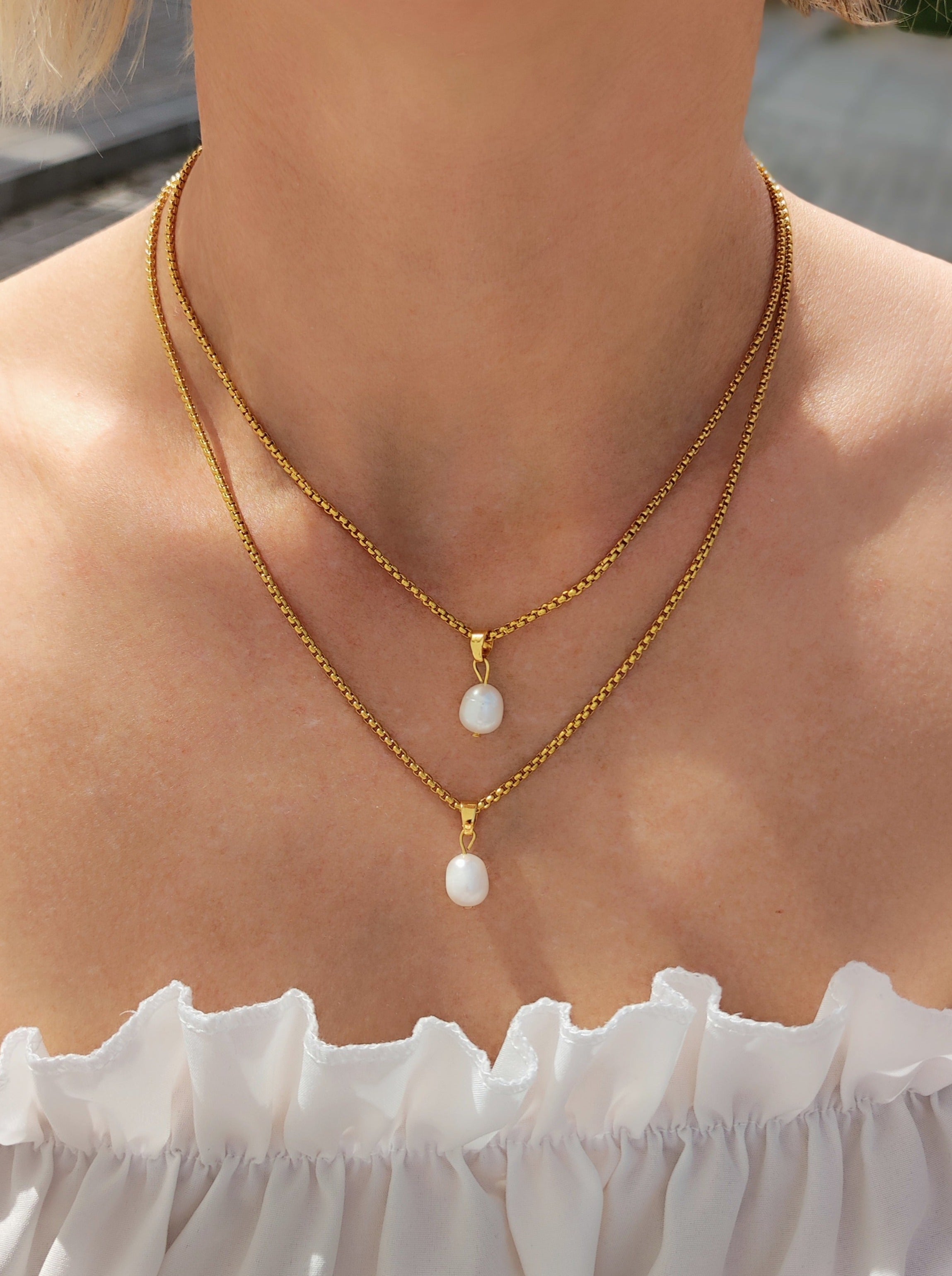 goldene Kette mit Perle