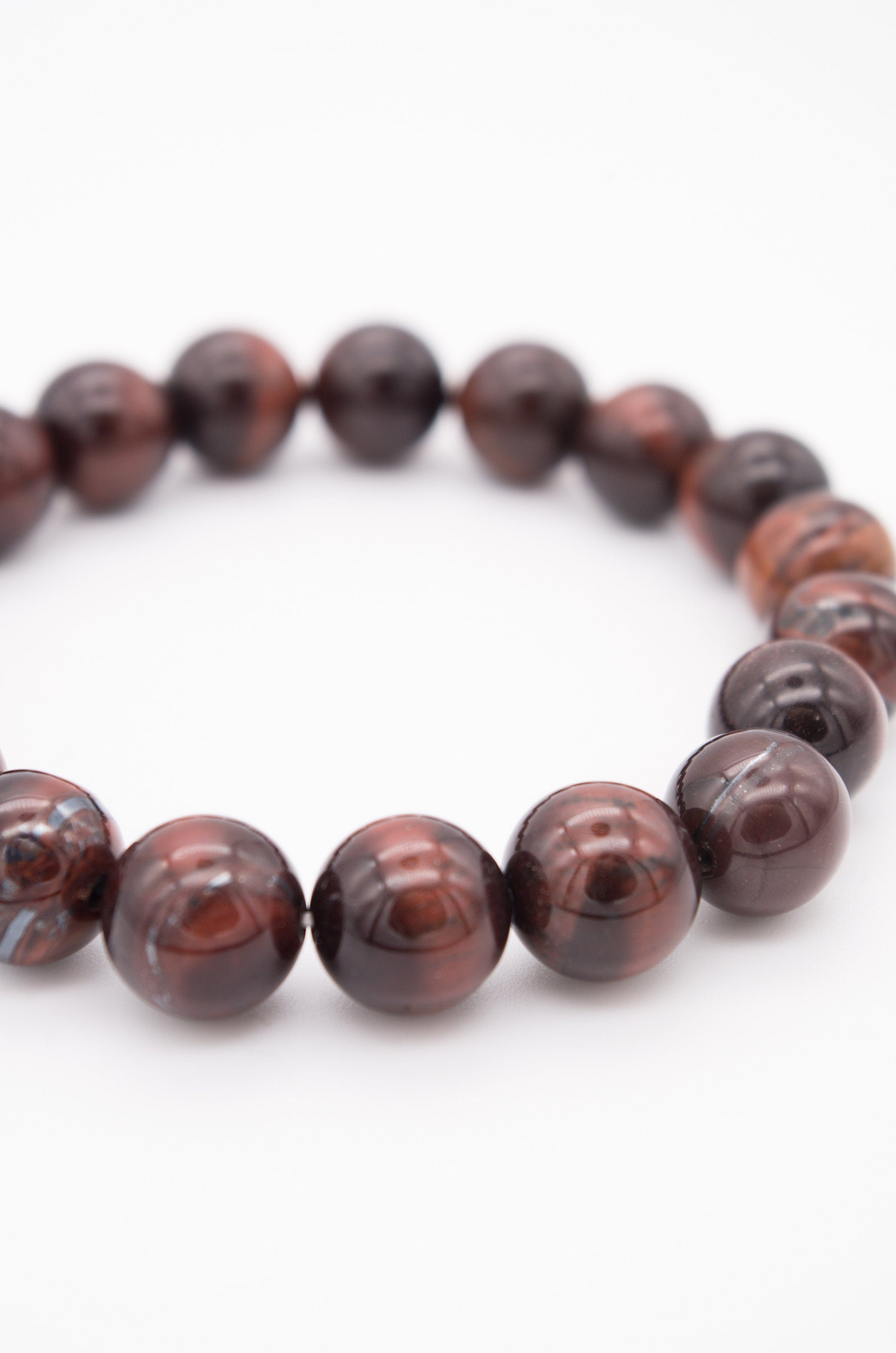 rote Tigeraugen Perlen