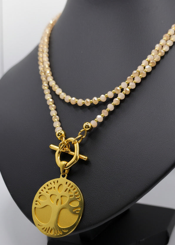 Lange Halskette mit kleinen Perlchen in Naturfarben/Gold