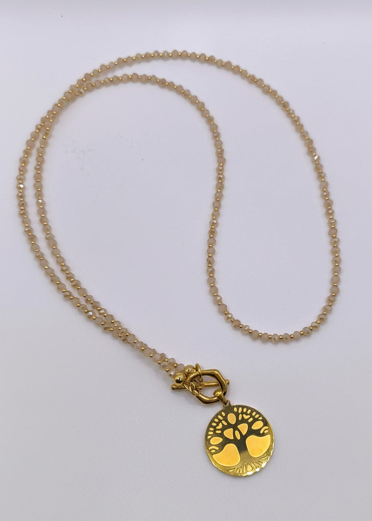 Lange Halskette mit kleinen Perlchen in Naturfarben/Gold
