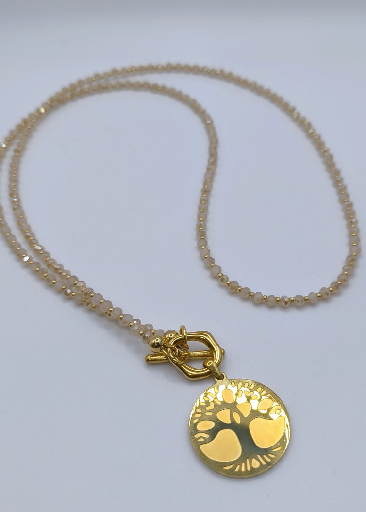 Lange Halskette mit kleinen Perlchen in Naturfarben/Gold