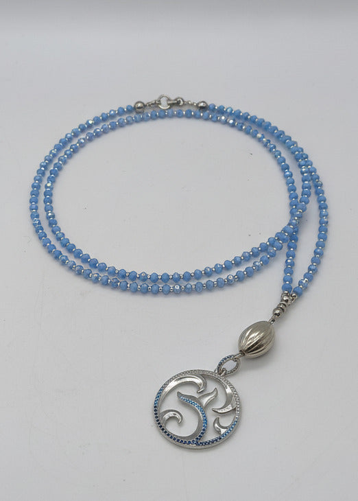 Lange, moderne Halskette mit maritimen Anhänger hellblau/silber