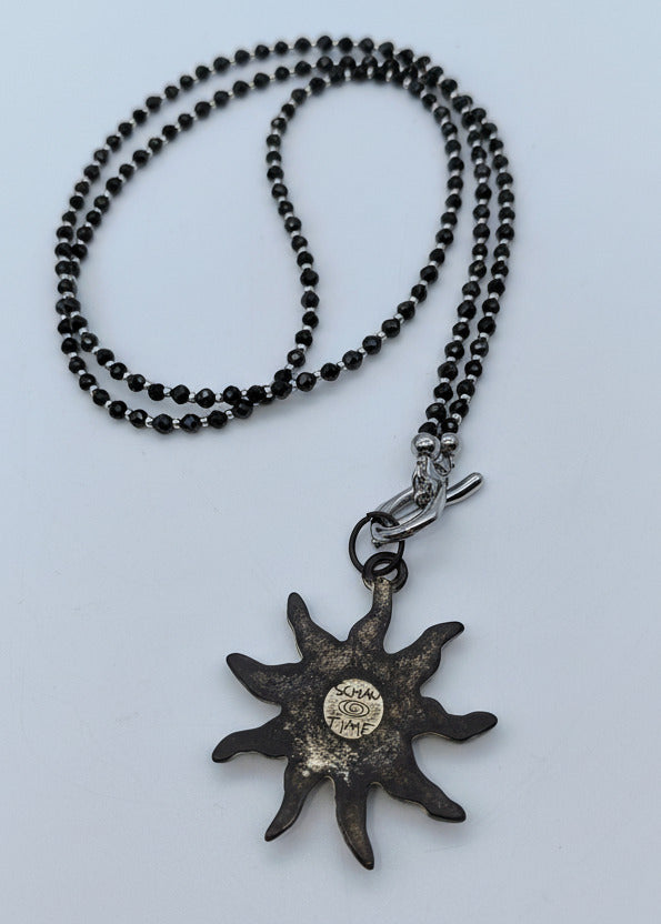 Lange Perlen Halskette "Sonne" schwarz/silber