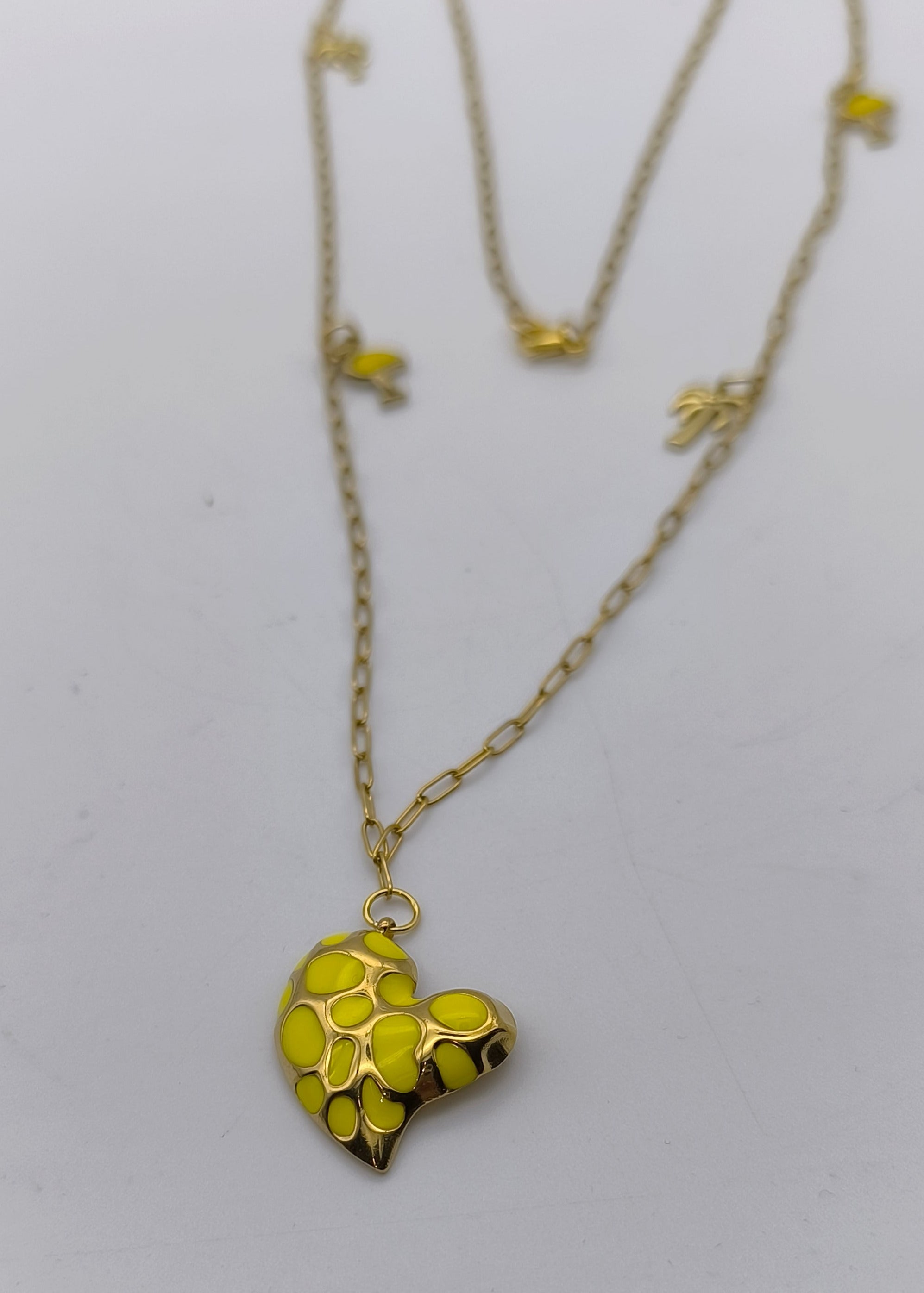 Halskette lang mit verschiedenen Charms goldfarben/gelb