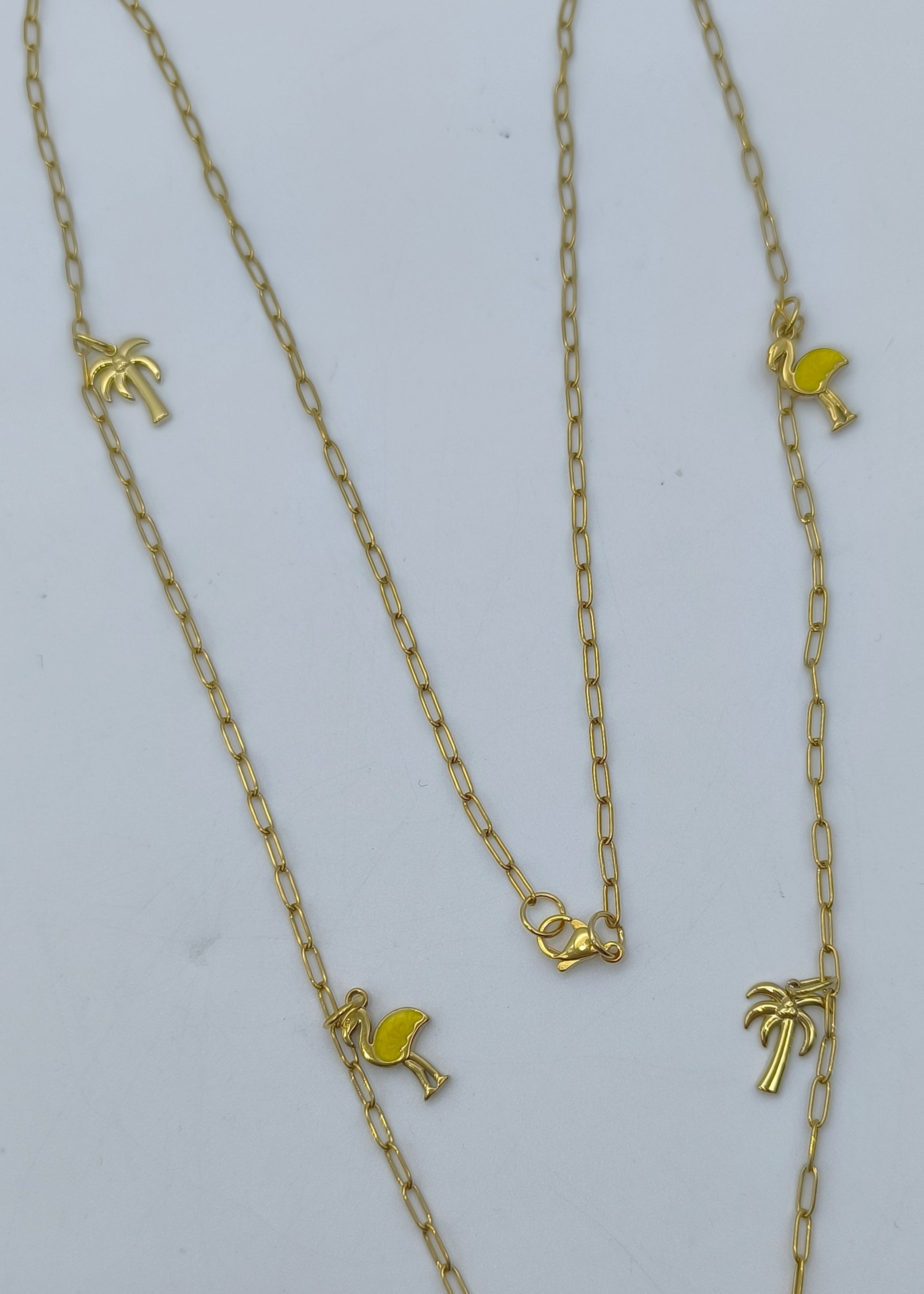 Halskette lang mit verschiedenen Charms goldfarben/gelb