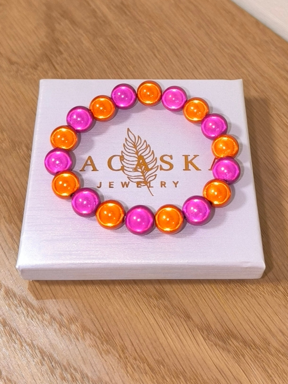 Magisches Perlenarmband -Mix Orange-Pink