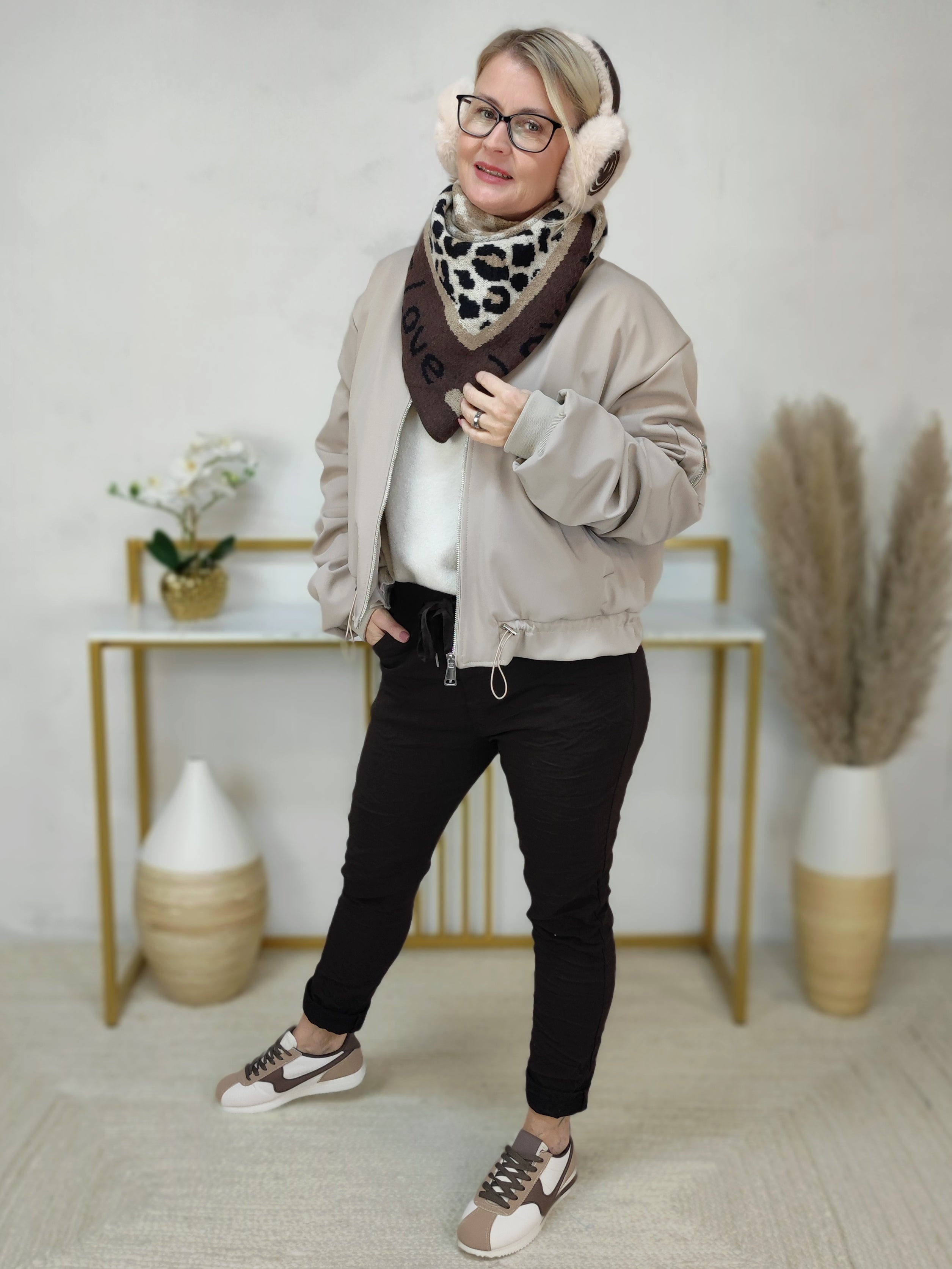 Weiche Ohrenschützer mit Smiley Muster in schoko und schwarz