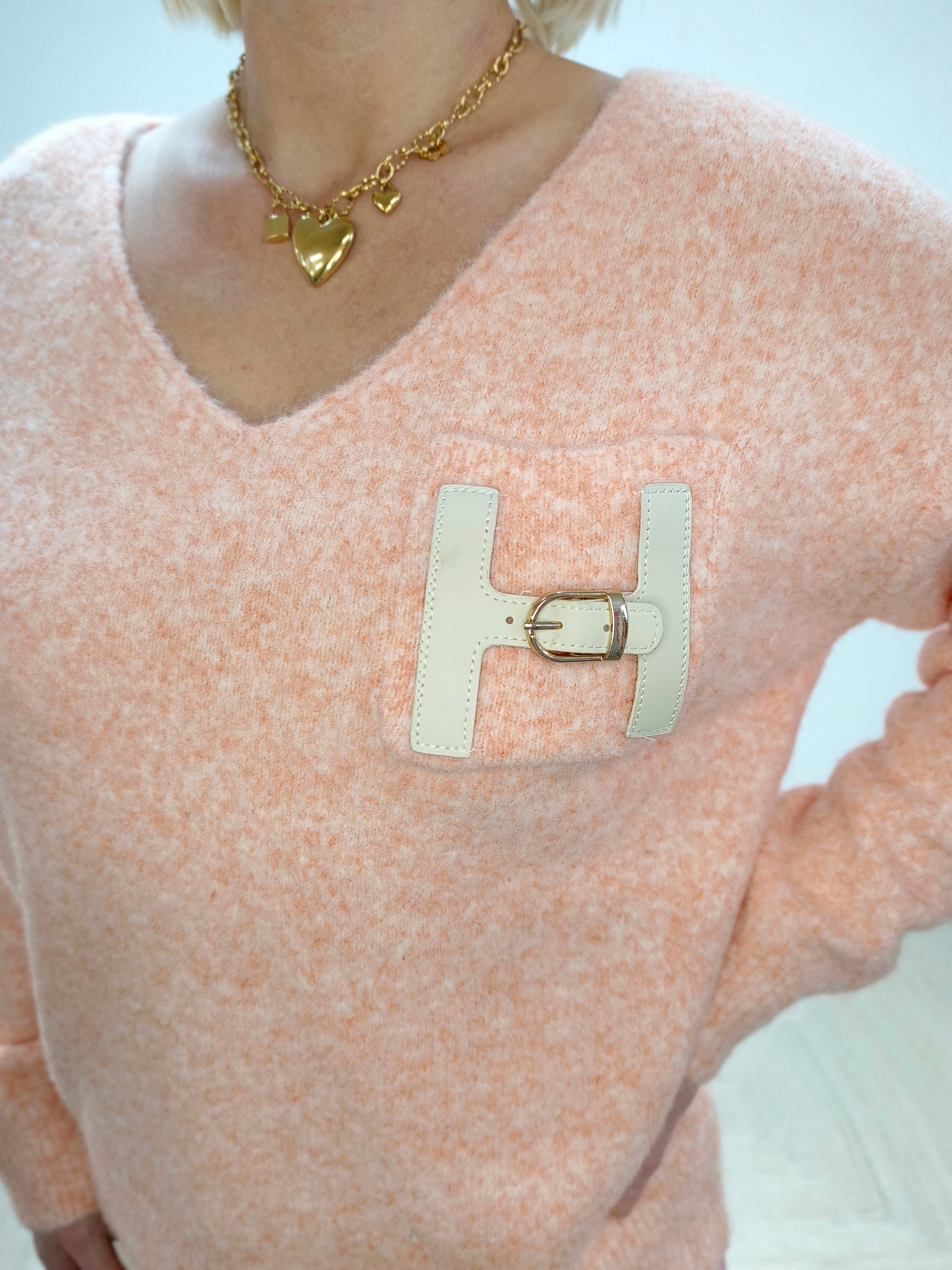 Weicher Pullover "H" pastell orange meliert (bis 42)