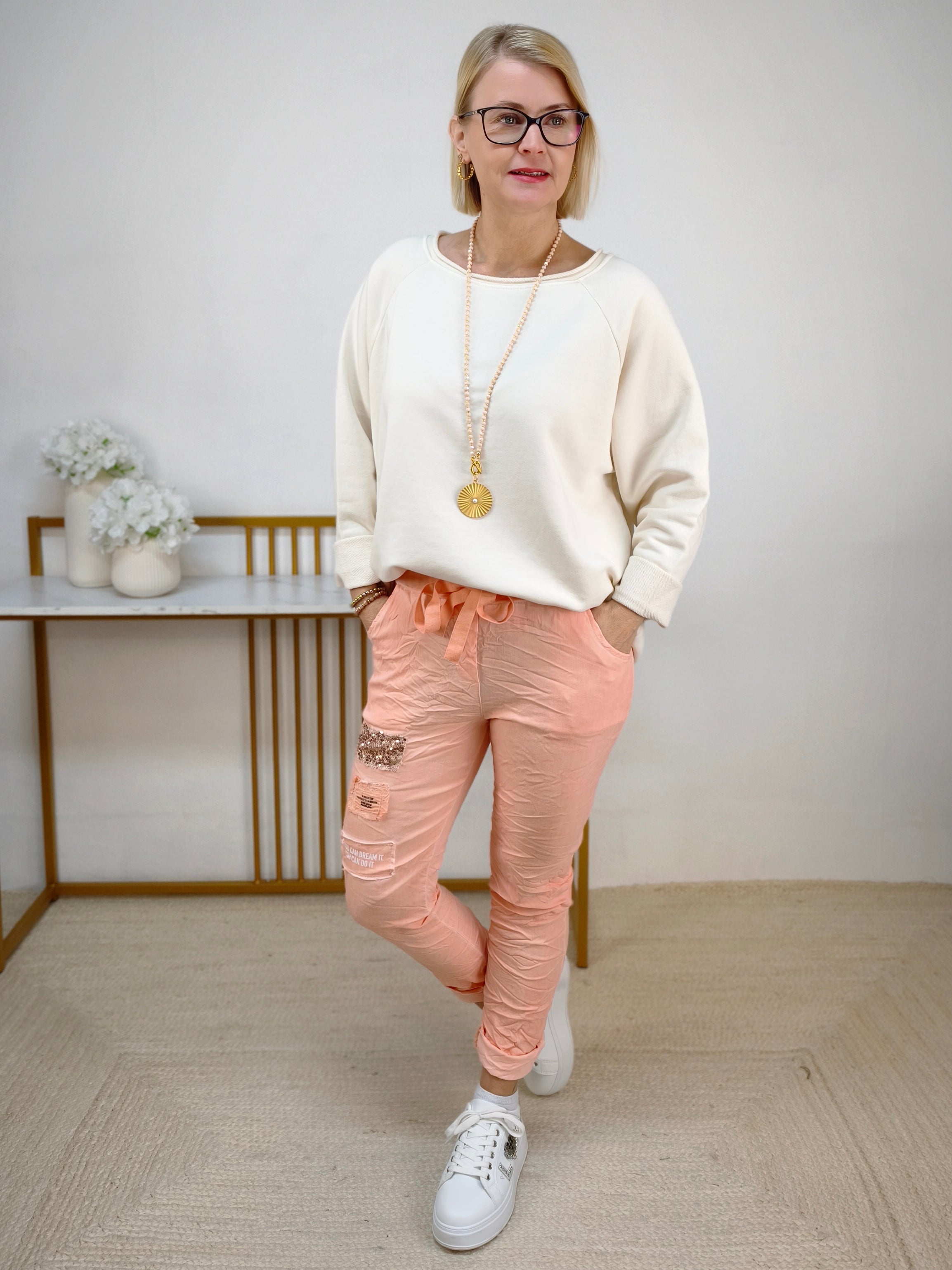 Einfarbiges Sweatshirt aus Baumwolle creme (40-44)